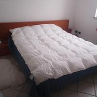 letto matrimoniale con comodini