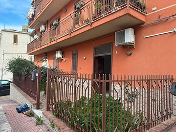 Piano terra con giardino