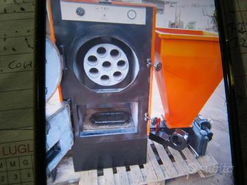 caldaia a biomassa sansa, legna, gusci di mandorle