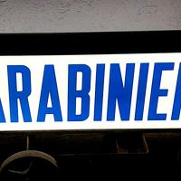 insegna luminosa bifacciale