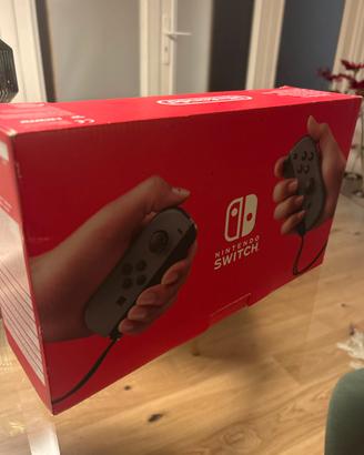 Nintendo Switch grigia + caricabatterie nuovo