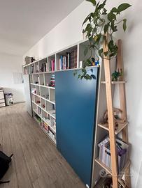 Libreria con ante scorrevoli Innovamobili