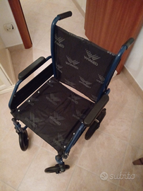 Carrozzina pieghevole