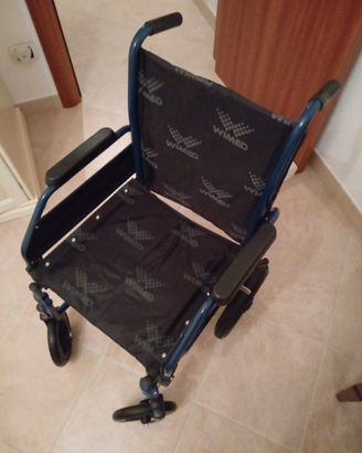 Carrozzina pieghevole