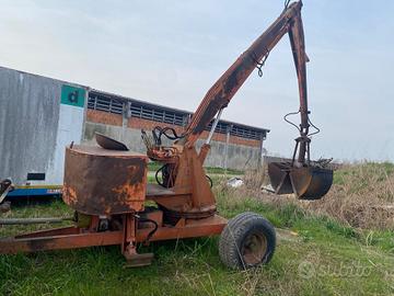 Trattore carica letame