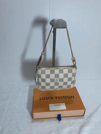 mimi pochette accessoires originale Louis Vuitton 