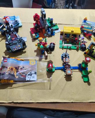 Lego 9 kit la maggior parte completi con personagg