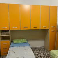 Armadio a ponte con letto