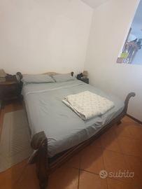 Letto in stile classico intagliato a mano