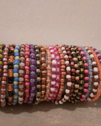 Bracciali di perline colorate leggere descrizione