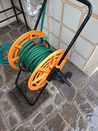 avvolgitore tubo acqua con ruote.