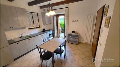 TRILOCALE CON CORTE E POSTO AUTO - zona centro