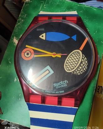 Orologio gigante Swatch da muro 