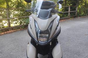 Tricity 125