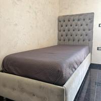 Letto singolo contenitore con testiera capitonné