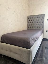 Letto singolo contenitore con testiera capitonné