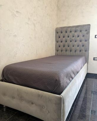 Letto singolo contenitore con testiera capitonné