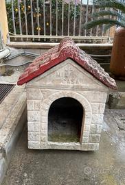 Cuccia in cemento da giardino per cani 