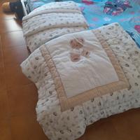 piumino e parabordi lettino 