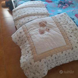 piumino e parabordi lettino 