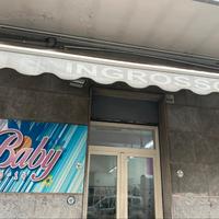 Tende per esterno negozi