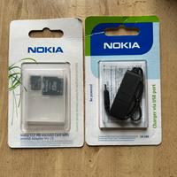 Nokia: micro e mini SD 512 MB, caricabatteria USB