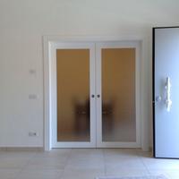 Porte tamburate qualità Spissu finestre posa