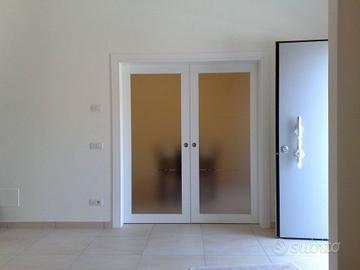 Porte tamburate qualità Spissu finestre posa