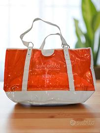 Borsa da spiaggia mare trasparente con borchie