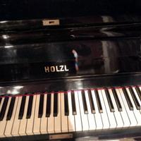 Pianoforte vericale .