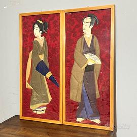 Antica coppia di pannelli con personaggi Giappones