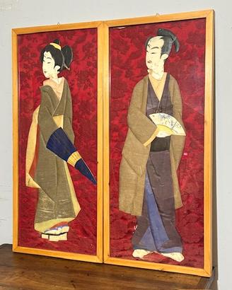 Antica coppia di pannelli con personaggi Giappones