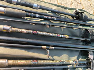 canne da carpfishing con mulinelli sacca e guadino