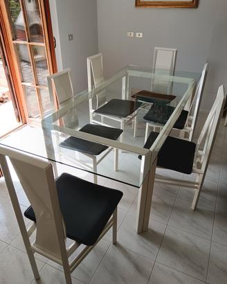 tavolo con vetro con sei sedie 