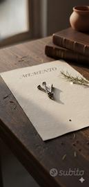 Amuleto religioso Memento