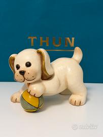 Cane con palla thun