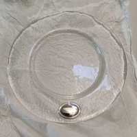 Sottopiatti marca Bagutta con effige in argento