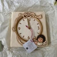 orologio angelo parete thun 