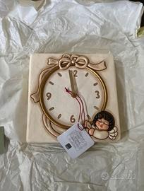 orologio angelo parete thun 