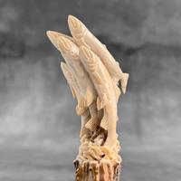 Salmoni scolpiti a mano