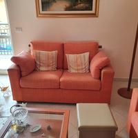  Parete attrezzata e divani