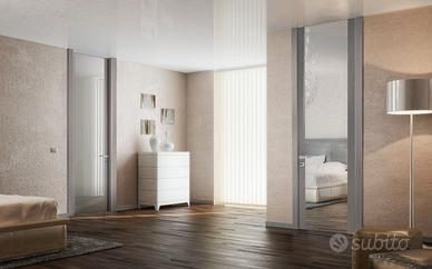 Ante scorrevoli con specchio per cabina armadio