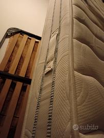 materasso e rete con doghe matrimoniale