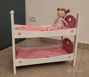 Lettino a castelloin legno per bambole