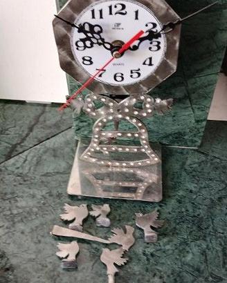 OROLOGIO IN ACCIAIO D' ARREDO A PENDOLO A MANO