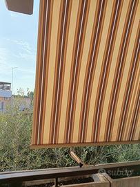 TENDA DA BALCONE A CADUTA CON BRACCI
