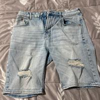 jeans corti strappati