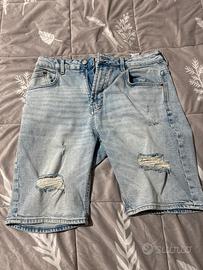jeans corti strappati