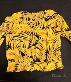 Blusa semi trasparente