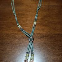 Collana etnica con perline verdi e pendente a farf